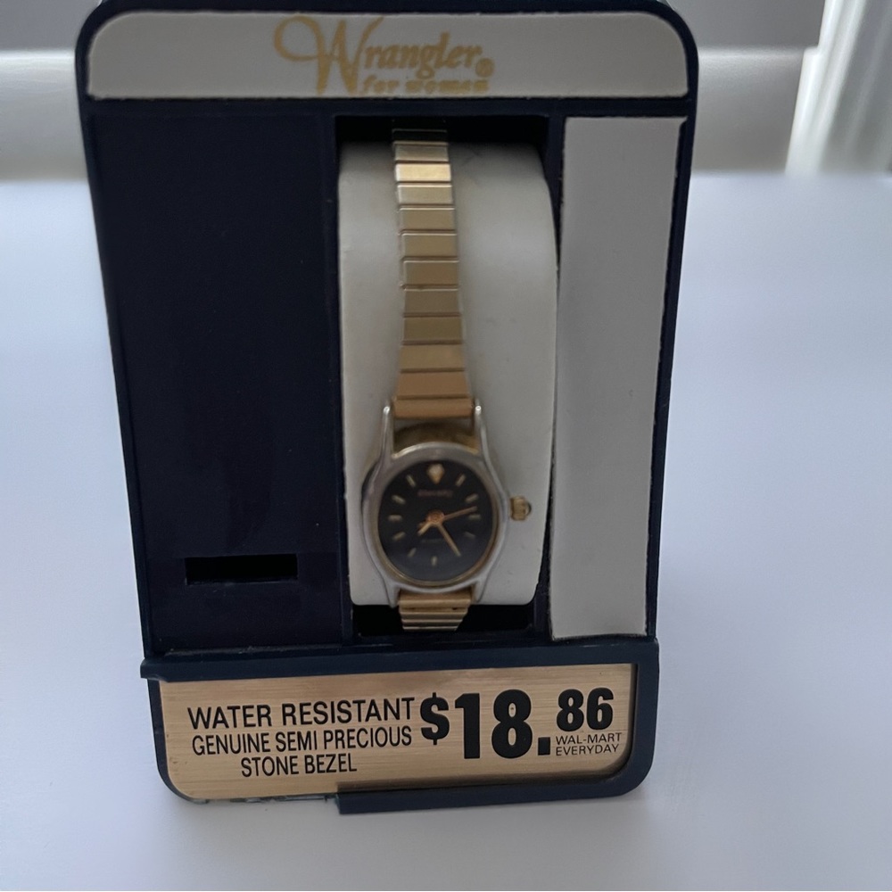- Wrangler Gold tone with black dial , womens wrist watch on stretch brace…